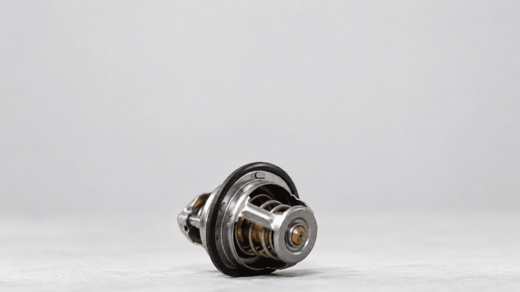 Disassembled car thermostat from the engine cooling system