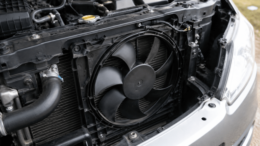 Car radiator fan in engine compartment with hood open